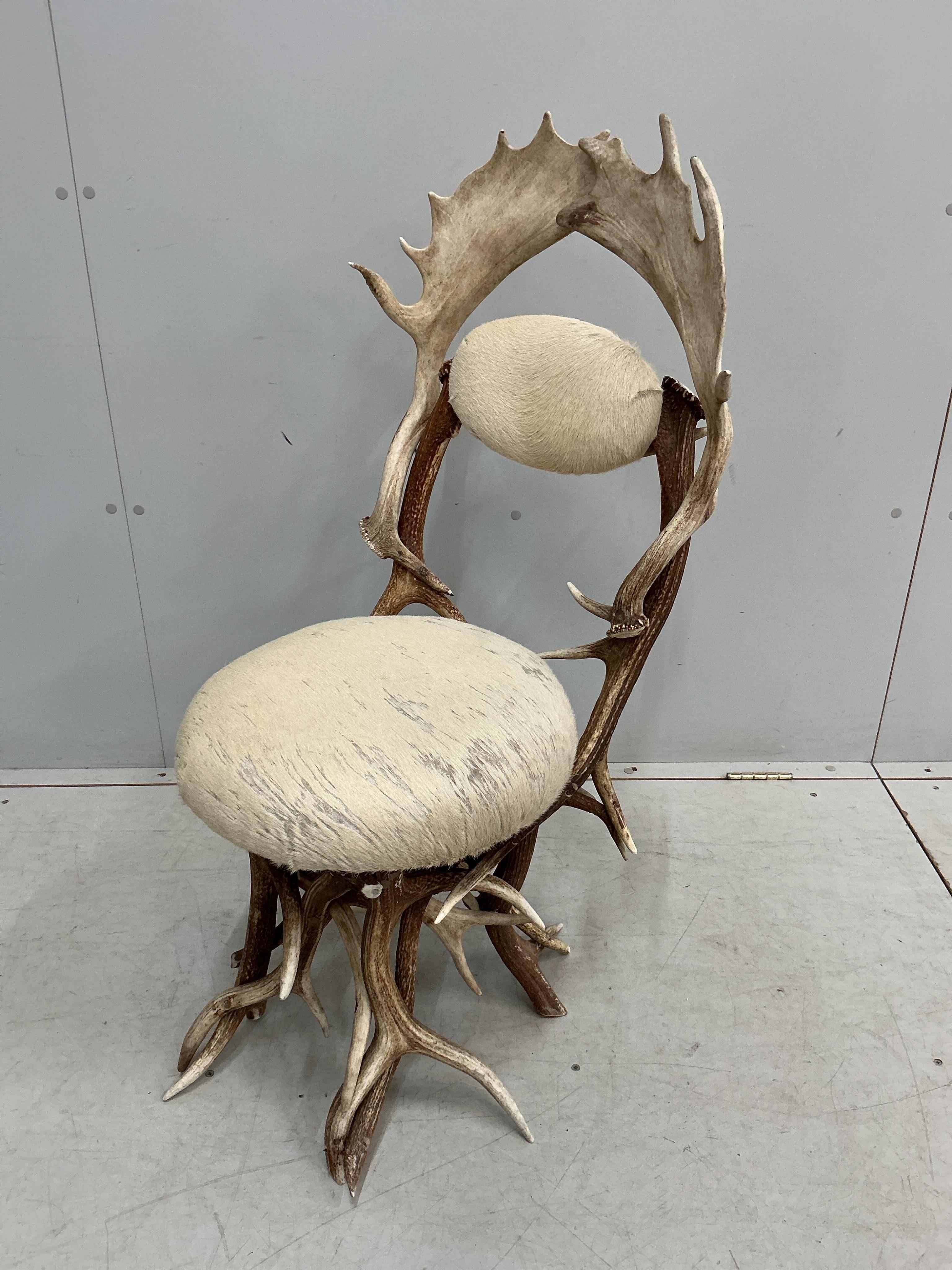 Danilo Shirato for Alps Atmosphere, Sarl, a pair of Italian ‘Fallen Antler’ side chairs with blond skin seats, width 50cm, depth 44cm, height 101cm